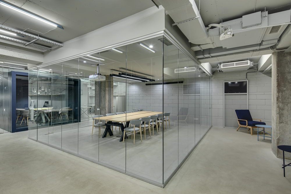 Office partitioning showing a conference room with glass walls